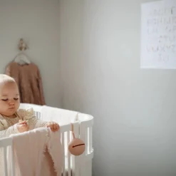 Mushie Pacifier Holder Hot